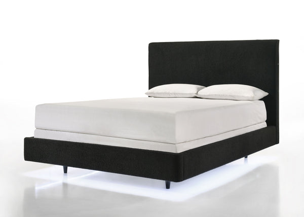 Discover the epitome of comfort and contemporary style with this floating illusion bed frame, accentuated by the underbed LED lighting. The rich black upholstery presents a tranquil and inviting aesthetic. Its high headboard offers an alluring charm and p