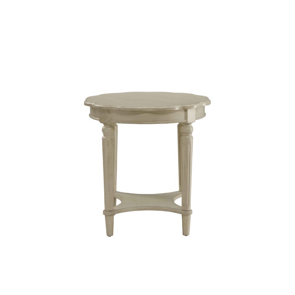 The French country-inspired Fordon occasional table is gracefully designed and made from quality materials. Scalloped round table top, turned legs and a bottom shelf, each piece is carefully crafted while superb functionality is kept in mind. This occasio