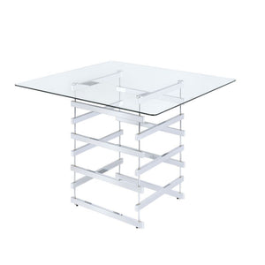 The Nadie counter height table features bold and light weight architectural lines. The chrome finished legs and stretchers create the implied sturdy box base, creating different patterns from all views. Contrasting with the 42-" square glass top, this din