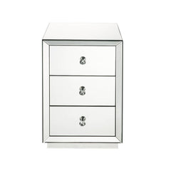 The Nyoka occasional table is perfect for your modern grace bedside. This dazzling table features a sturdy wood frame fully lined in beveled mirrors that will reflect light and your bold beauty. Its three drawers boast crystal knobs and are right size for