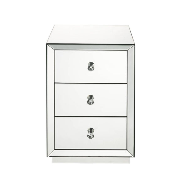 The Nyoka occasional table is perfect for your modern grace bedside. This dazzling table features a sturdy wood frame fully lined in beveled mirrors that will reflect light and your bold beauty. Its three drawers boast crystal knobs and are right size for