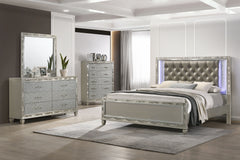 Discover the Radiance King 4 Piece Bedroom Set in Platinum Silver, meticulously crafted to offer unparalleled stability and durability from a combination of Solid Rubberwood and manufactured woods. Its semi-gloss lacquer Platinum Silver finish lends a sil