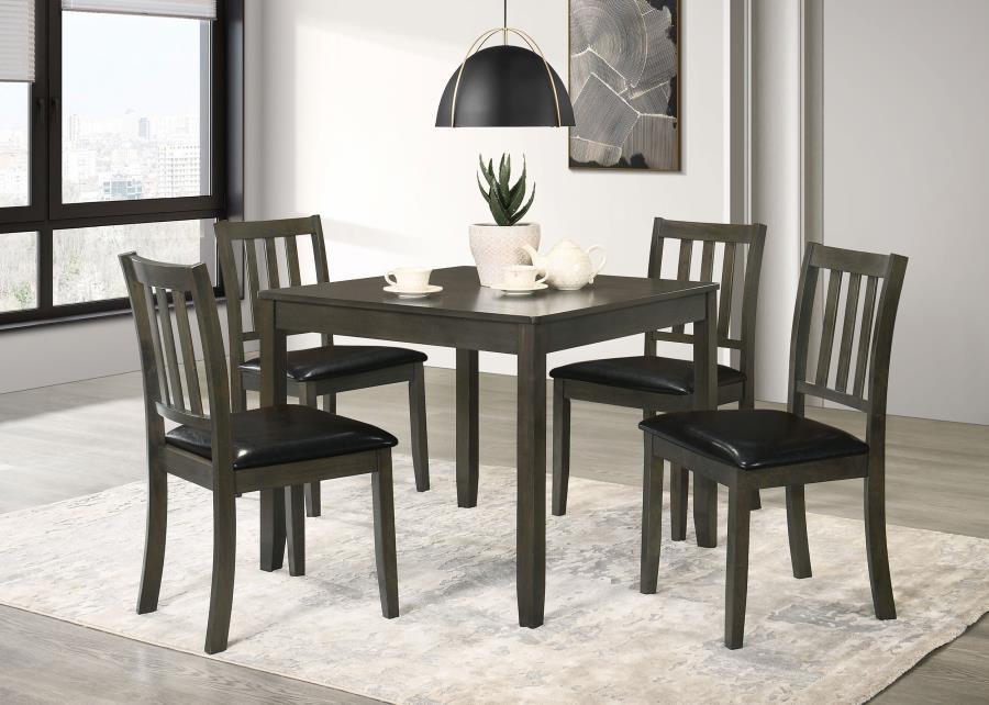 Perfectly sized for a breakfast nook or compact dining room, this contemporary five-piece dining set offers inviting style and a compact profile. The set centers on a square dining table crafted of wood with okume veneer in a stylish, neutral finish. Four