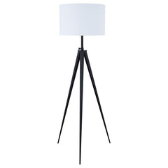 Spruce up the lighting in your home with this modern three-legged floor lamp. Featuring a mid-century design in traditional black and white colors, this lamp is excellent in a home with classic black decor or modern white furnishings. The white linen-like