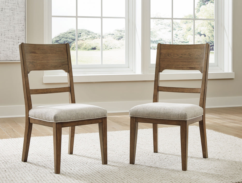 This dining chair sits comfortably at the intersection of modern lodge and farmhouse aesthetics. Your warm and welcoming disposition is reflected in its charming architectural elements and neutral textural fabric. Even with its poise, the chair remains pr