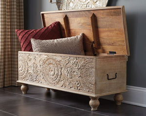  this storage bench stands out from the crowd in an intriguing way. Its grainy wood is beautified with an antique white finish