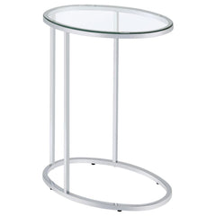 This oval side table features a sleek, modern design with a clear tempered glass top that offers both durability and elegance. Its minimalist metal frame, electroplated in chrome, provides a polished, reflective finish that enhances its contemporary aesth