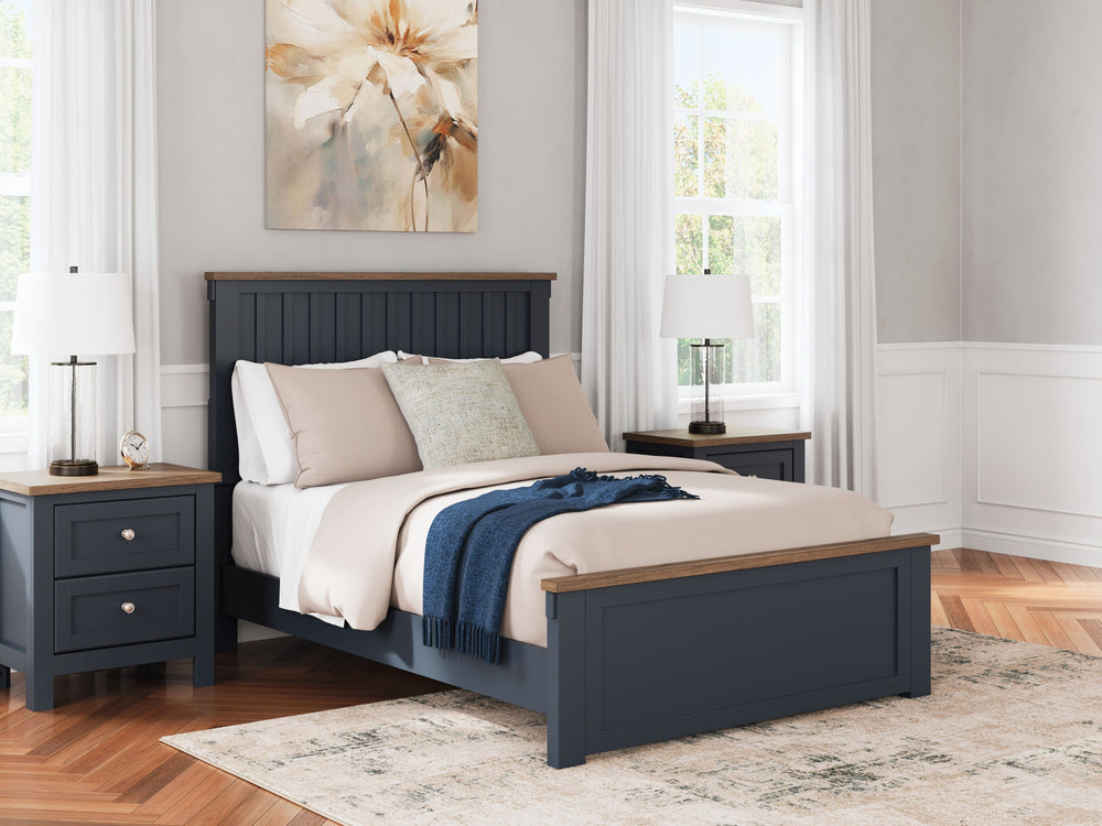 Add homespun charm to your restful retreat. A modern take on a timeless silhouette, this Landocken full panel bed pairs a dark slate blue finish with light brown accents. The slatted headboard in a classic Shaker style brings an air of beautiful simplicit