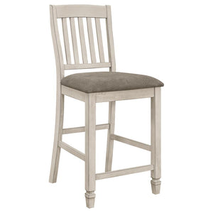  counter height stool blends a rustic cream finish with a soft
