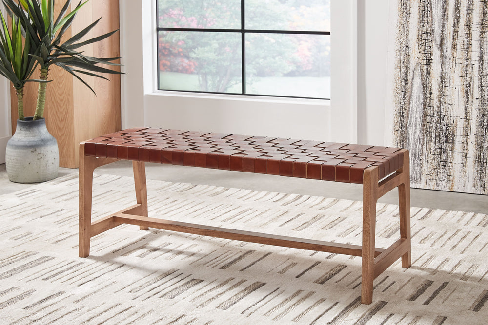 Express your sense of contemporary yet comfortable style with this accent bench. Its on-trend frame is accented by brown leather strips in a basket weave pattern for a mid-century modern aesthetic. Tuck this modern gem into an entryway or home office.<br/