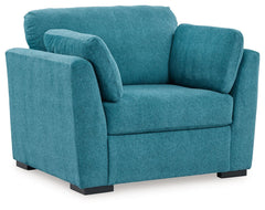 You want your home to reflect your modern, trendy eye for design. This oversized chair is here to help. Bold, bright and beautiful, it adds a fashion-forward pop of color to your living room. Velvet-like upholstery and matching bolster pillows keep comfor