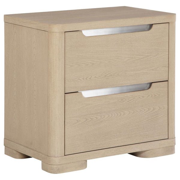 Blending sleek design with practical functionality, this nightstand features a light elm finish and brushed nickel fingertip pulls for a subtle sparkle. Rounded corners enhance its modern appeal, while two extra-large drawers offer ample space for bedside