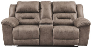  this reclining loveseat delivers both with ease. Its high-performance padded faux leather is remarkably durable and easy to clean