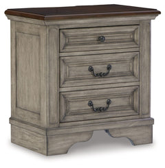 Cottage quaint styling and quality construction make this nightstand a dream come true. A two-tone finish provides rustic warmth, with an antiqued gray body and a rich, deep walnut on the top. The three smooth-gliding drawersâ€™ framed fronts and dark bro