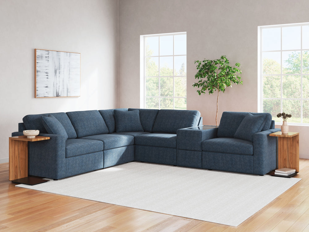 Looking cool and contemporary is great. But when it comes down to it, youâ€™re all about low-maintenance lounging. With the performance fabric on this sectional with console, cleaning spills is a breeze. Its customizable modular design caters to your ever