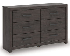 Designed with everyday style in mind, this dresser is a simply chic approach to modern living. A dark charcoal finish blends black and brown undertones, creating a versatile look that effortlessly pairs with your existing pieces. And for must-have functio
