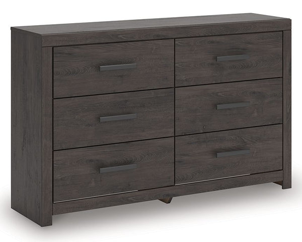 Designed with everyday style in mind, this dresser is a simply chic approach to modern living. A dark charcoal finish blends black and brown undertones, creating a versatile look that effortlessly pairs with your existing pieces. And for must-have functio