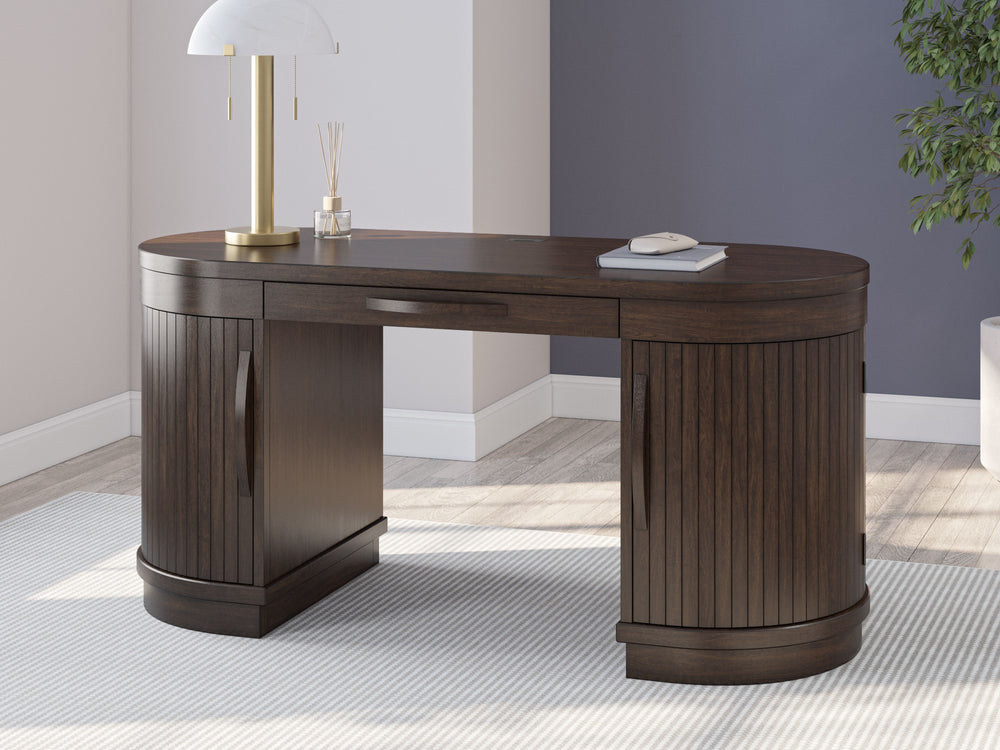 Casual contemporary design. Made with hardwood solids and veneers with MDF substrate. Finished in a rich warm brown wood tone that enhances the wood grain character. Executive style desk with an upscale design. Desk features 2 half round door cabinets wit