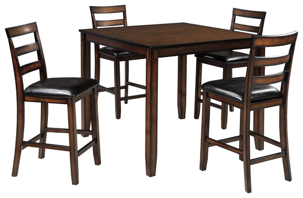 This counter table set raises the bar on how beautiful simplicity can be. A wonderfully clean-lined profile is dramatically enriched with a complex, burnished finish loaded with tonal variation and rustically refined character. Cushioned bar stools in a p