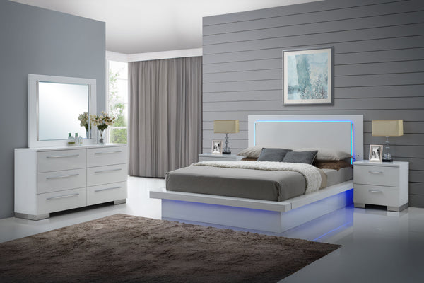 Elevate your bedroom with the Sapphire Modern 5-Piece Bedroom Set in high gloss white. This stunning set includes a lighted panel bed, dresser, mirror, and two nightstands, all crafted from premium manufactured wood with a flawlessly smooth, ripple-free s
