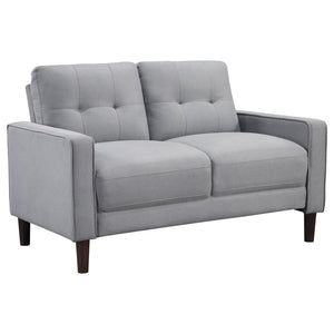 Ideal for studio apartments or small rooms, this loveseat boasts a perfect small-scale design. Its classic track arm and self-welt detailing highlight the superior tailoring. The grid-tufted boxed back cushions and pocket coil spring cushion construction 