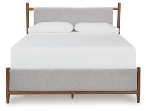  featuring a sling-style cushioned headboard
