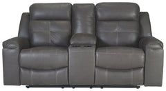 Rustic character comes forth in this reclining loveseat with console. Designer stitching adds a fashion-forward touch to its soft cushions. Faux suede fabric speaks to your knack for superior-quality materials. The loveseatâ€™s high back provides ample su