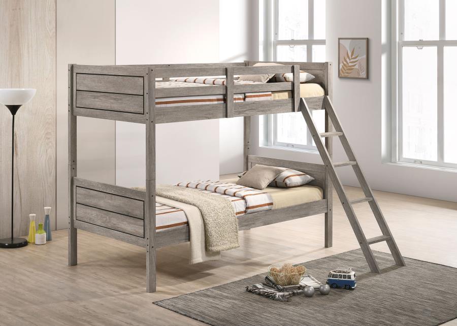 Minimal, clean shapes and lines invite you to rest in this transitional bunk bed. Designed in a weathered taupe finish accented by a dark border along the sides, this understated bunk bed is the perfect addition to a modern farmhouse home, or a contempora