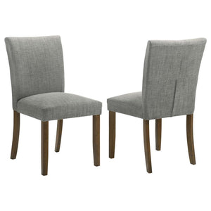 Upgrade your dining table with the fresh silhouettes and contemporary flair of this set of two modern side chairs. Each boasts an armless profile and lovely upholstery that creates the perfect touch of texture. Foam cushions provide exemplary comfort, per
