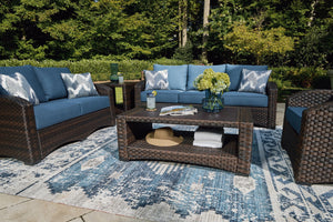 Brown resin wicker woven on an aluminum frame. High performance Nuvella fabric. Stainless steel hardware. Two throw pillows included with loveseat and sofa. <h4><b>Windglow - Blue/Brown - Sofa with Cushion</b></h4> <table width=-"100%-"><colgroup><col sty