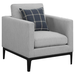 Curl up with a good book and unwind after a long day. This cozy chair is the perfect foundation for casual relaxation. A comfortable back and seat cushion allow for hours of leisurely lounging. Soft, grey upholstery gives it a touch of subtle style. Its s