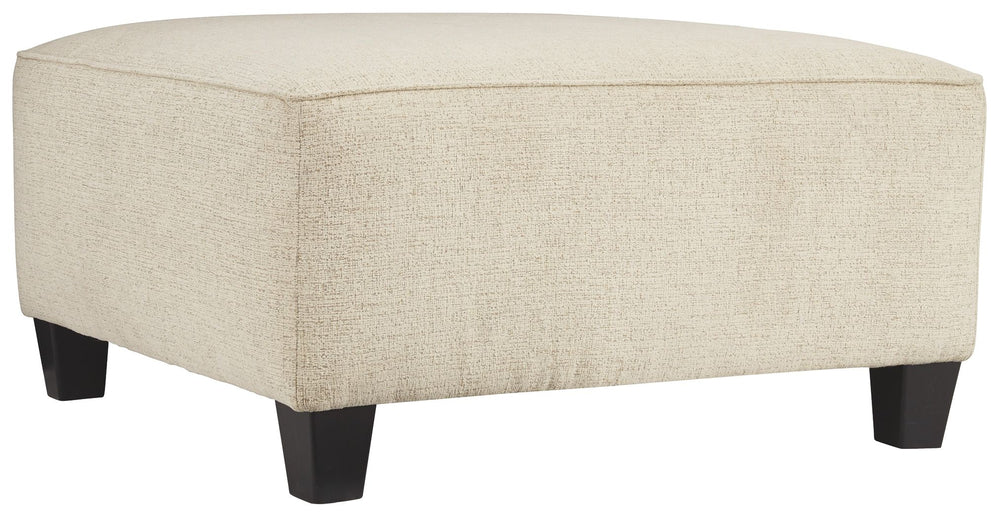 If youâ€™re looking to lighten the mood, youâ€™re sure to find this oversized ottoman a breath of fresh air. Covered in a cream chenille upholstery loaded with plush texture, this less-is-more contemporary ottoman is one sensational sidekick.<br><br><b>Ad