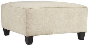 If youâ€™re looking to lighten the mood, youâ€™re sure to find this oversized ottoman a breath of fresh air. Covered in a cream chenille upholstery loaded with plush texture, this less-is-more contemporary ottoman is one sensational sidekick.<br><br><b>Ad