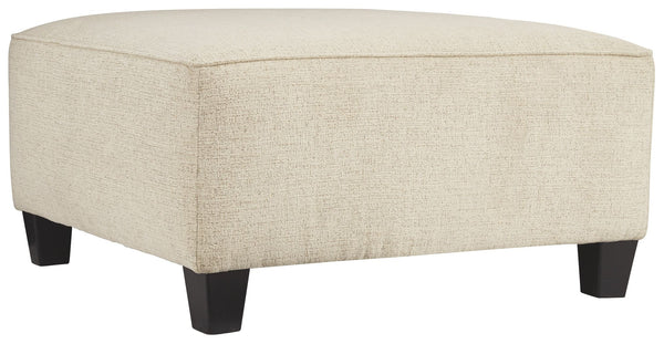 If youâ€™re looking to lighten the mood, youâ€™re sure to find this oversized ottoman a breath of fresh air. Covered in a cream chenille upholstery loaded with plush texture, this less-is-more contemporary ottoman is one sensational sidekick.<br><br><b>Ad