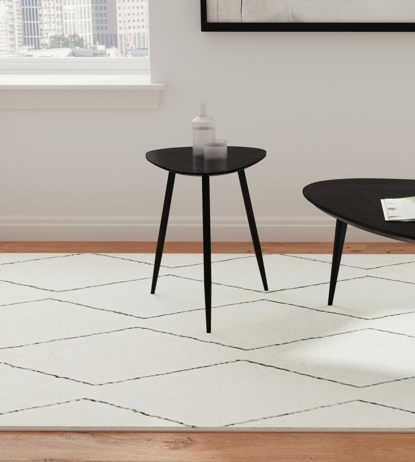 Introduce a modern flair to your living room or den with this sleek wooden end table. Finely crafted from solid mango wood, its deep black finish enhances its timeless elegance. The triangular tabletop features rounded corners, lending a softened, contemp