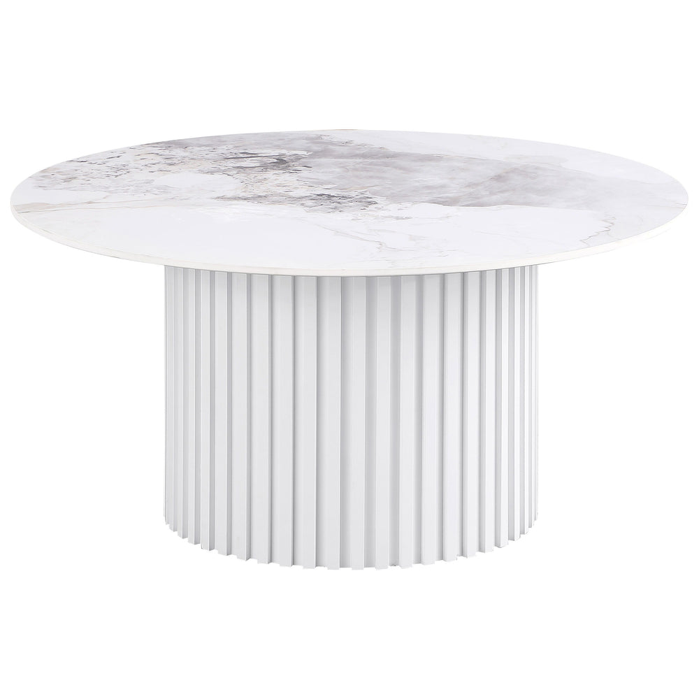 This round coffee table showcases a luxurious sintered stone top with elegant veining, offering durability and style for modern living spaces. The sturdy metal base features a fluted design and a sleek white powder-coated finish, providing a clean and con
