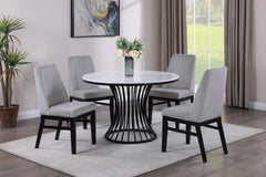 This dining set is a sophisticated blend of contemporary design and artistic flair, ideal for modern homes seeking a touch of elegance. The set features a sleek, round table with a faux marble top that is both beautiful and easy to care for. The table-'s 
