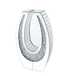 Display your dazzling sense of style with Noralie Accent Decor. Fitting in a variety of design aesthetic, this piece showcases an oval mirrored frame, with clear beveled glass surface and faux diamonds inlay that highlight its glamorous style. The accent 