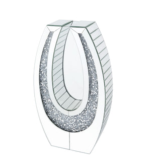 Display your dazzling sense of style with Noralie Accent Decor. Fitting in a variety of design aesthetic, this piece showcases an oval mirrored frame, with clear beveled glass surface and faux diamonds inlay that highlight its glamorous style. The accent 
