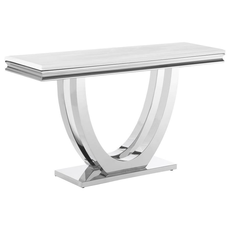 This modern console table showcases luxury and elegance with a sintered stone top that features a marble-like appearance and beveled edges. The sweeping demilune pedestal base, crafted from polished stainless steel, adds sculptural beauty and durability. 