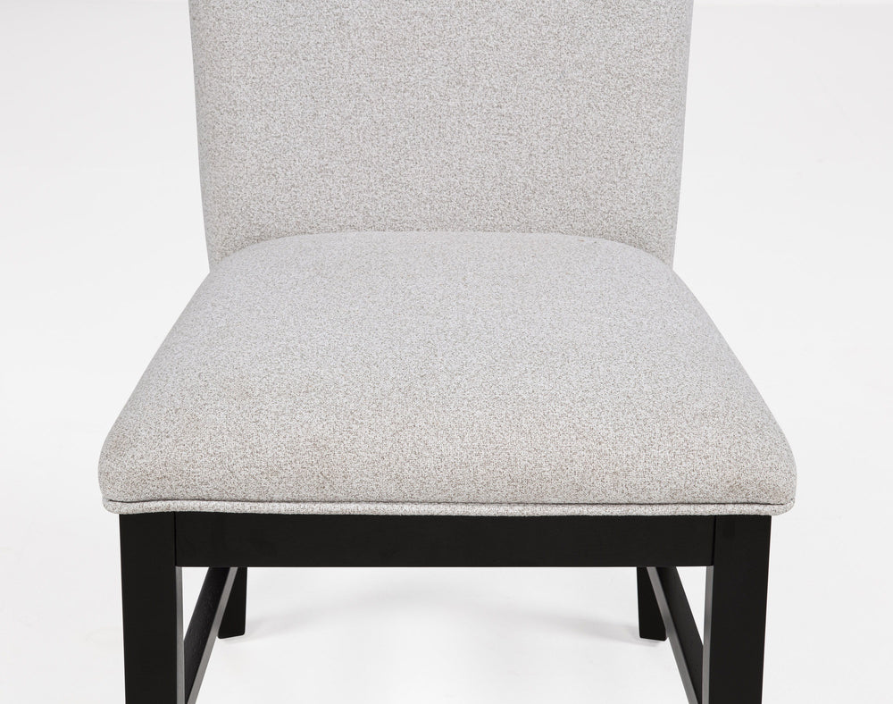 Elevate your dining experience with this contemporary ensemble that perfectly balances style and functionality. Featuring a bold, concrete-inspired tabletop and sleek black supports, this centerpiece is both striking and durable, ideal for modern living. 