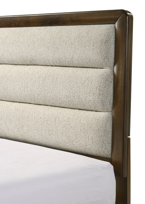  luxurious focal point. Complementing the bed are a tall chest of drawers a