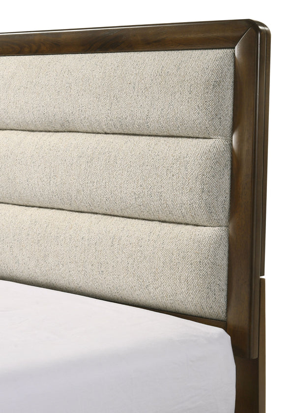  luxurious focal point. Complementing the bed are a tall chest of drawers a