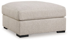 Reminiscent of a fine, subtly patterned herringbone jacket, this casually elegant ottoman offers contemporary style in spades. Its oversized silhouette provides plenty of leg room, while a soft feather-blend top cushion maximizes relaxation. Why skimp on 