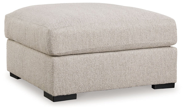 Reminiscent of a fine, subtly patterned herringbone jacket, this casually elegant ottoman offers contemporary style in spades. Its oversized silhouette provides plenty of leg room, while a soft feather-blend top cushion maximizes relaxation. Why skimp on 
