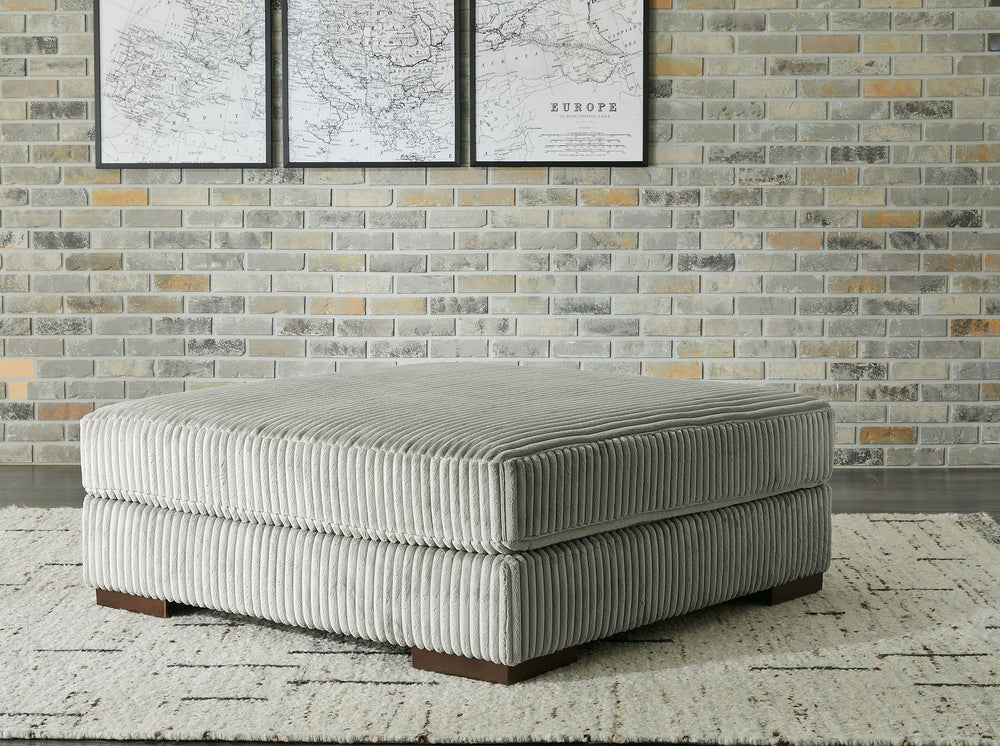 Plush and posh. Showcase your eye for on-trend texture with the statement-making cord upholstery of this oversized accent ottoman. Its stunningly soft fabric entices in a warm neutral hue, complementing contemporary color palettes. Let your feet sink into
