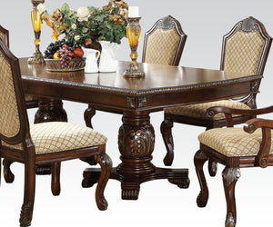 The Chateau De Ville traditional dining collection features elegant styling decorative carving and a combination of exotic materials. The double pedestal dining table with extended two leaves is accented by decorative base and feet. Matching hutch and buf