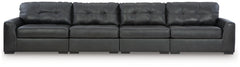 Discover lasting luxury with this sectional. You-'ll experience the perfect blend of comfort and stylish design with its combination of leather and faux leather. Featuring tufted detailing and low-profile legs, this must-have set ensures both coziness and