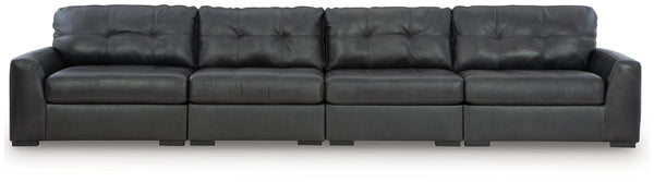 Discover lasting luxury with this sectional. You-'ll experience the perfect blend of comfort and stylish design with its combination of leather and faux leather. Featuring tufted detailing and low-profile legs, this must-have set ensures both coziness and
