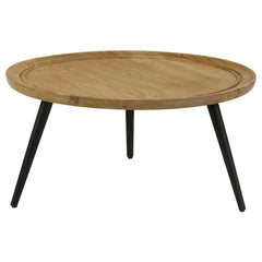 This round coffee table merges mid-century charm with rustic appeal for a timeless addition to your living room. Crafted from solid mango wood with a natural finish, it showcases unique wood grain patterns and a softly beveled edge for a subtle dish-like 